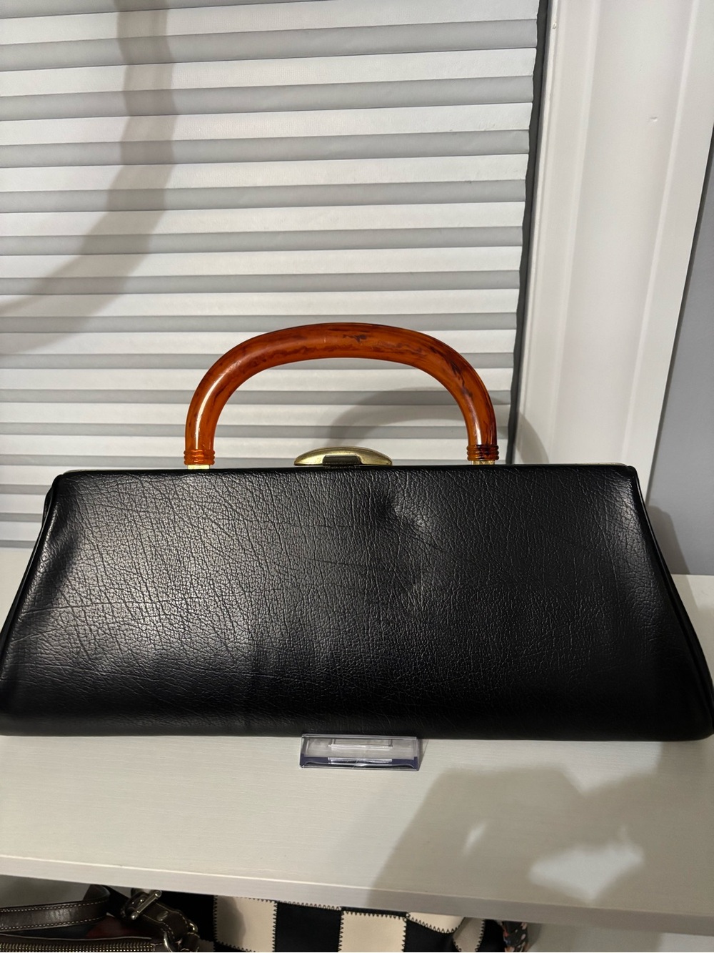 Black Leather Top-Handle Bag with Amber Handle